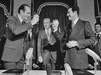 Jacques Chirac toasts Saddam Hussein after concluding a commercial agreement in 1974.  During the early years of the Mullahs' War, France was the largest supplier of weapons to Iraq.